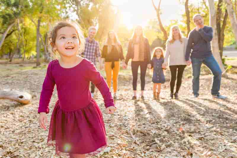 cheerful-family-holding-hands